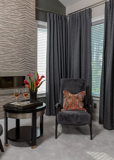master sitting room with orange pillow